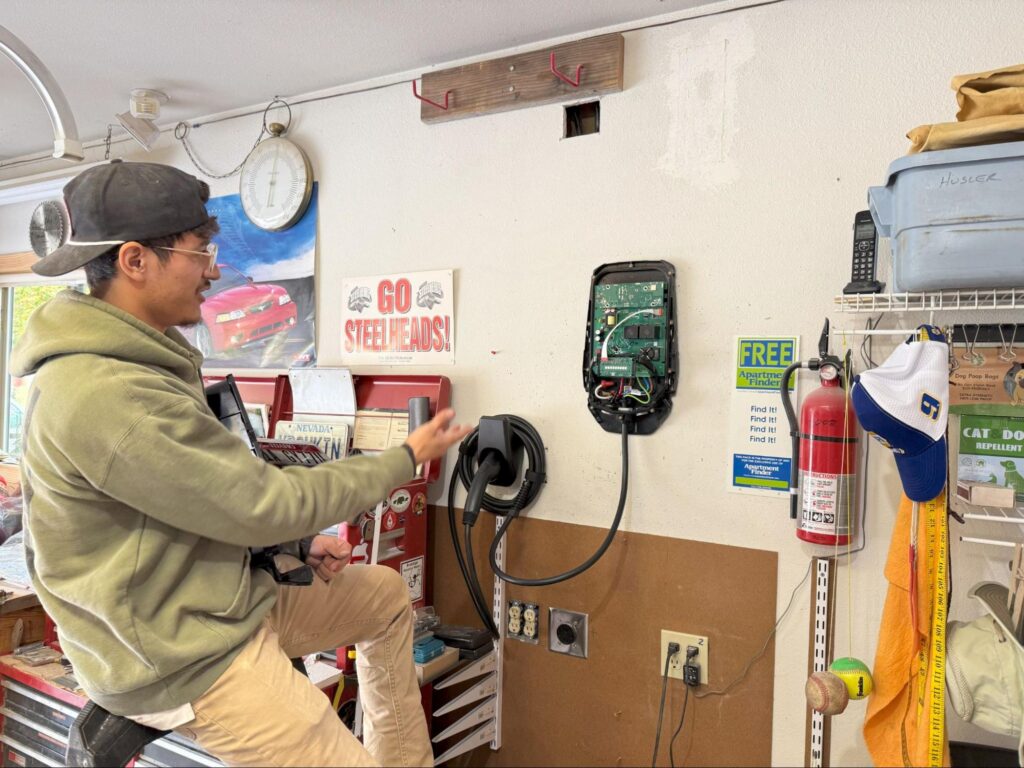 All 4 You Electrical technician wiring a Level 2 EV charger during an installation at a Boise, ID home.
