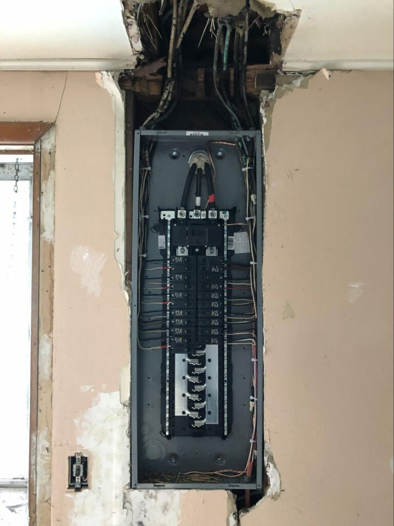 New 200 amp electrical panel with labeled circuit breakers installed in a Meridian, ID home.