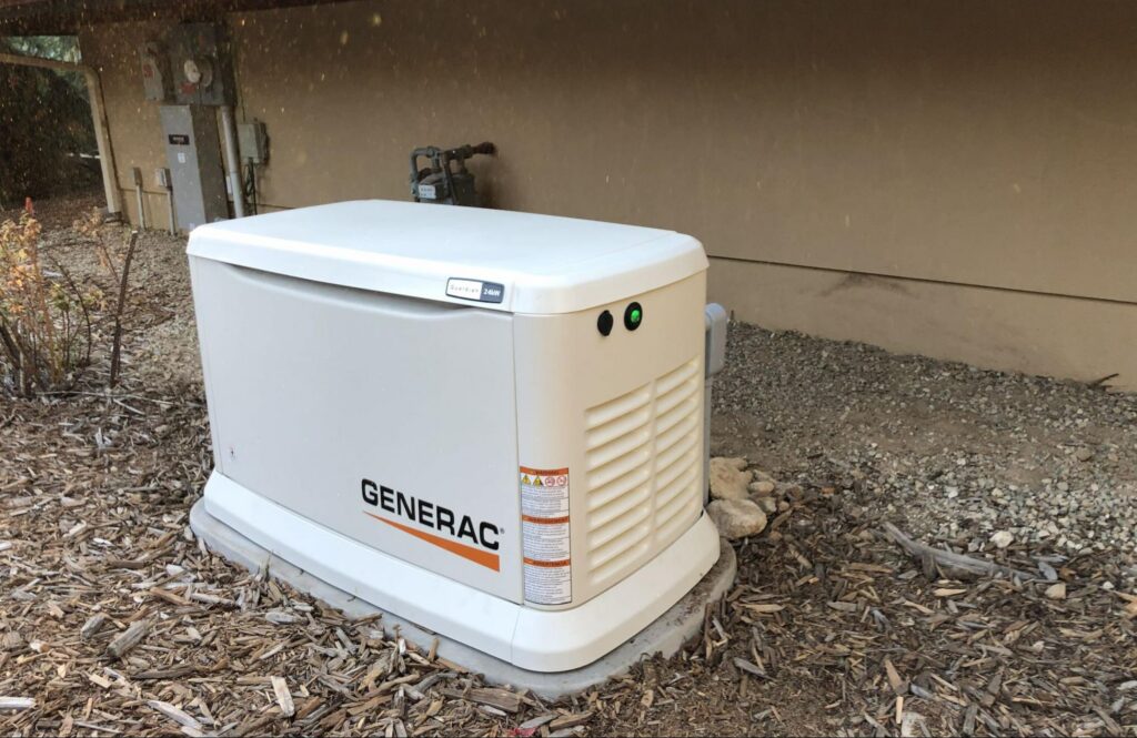 Standby generator installed on a concrete pad next to the gas meter at a Nampa home.